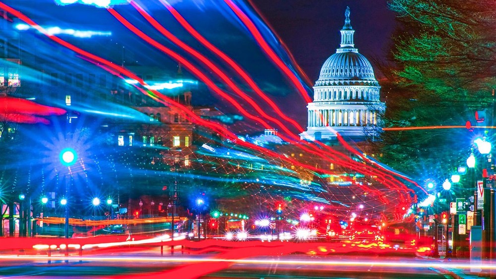 Stylized view of the US Capitol building with streaking lights